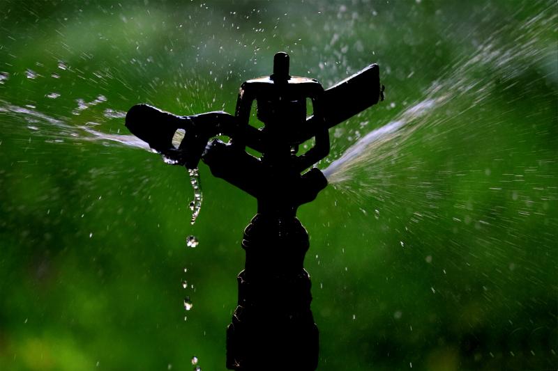 photo of sprinkler by Mani Sankar on Unsplash